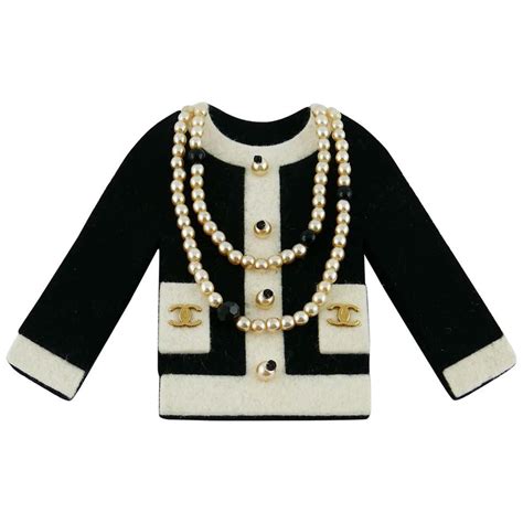 black chanel broch|chanel jacket brooch.